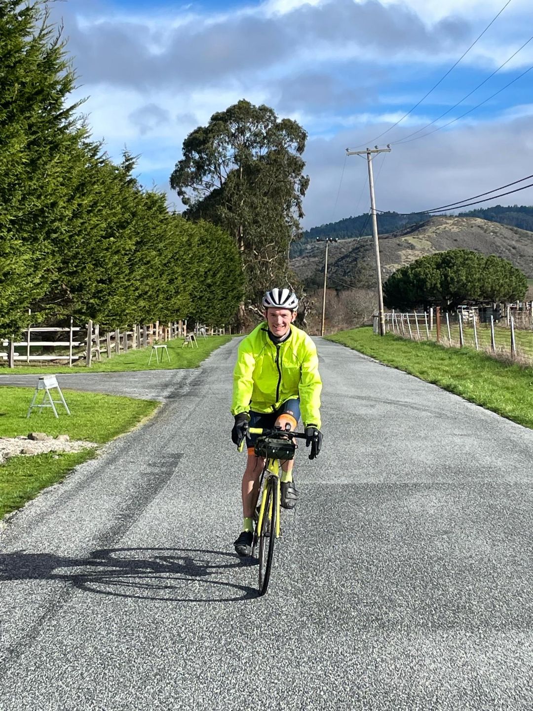 James on a weekend bike ride along a rural road